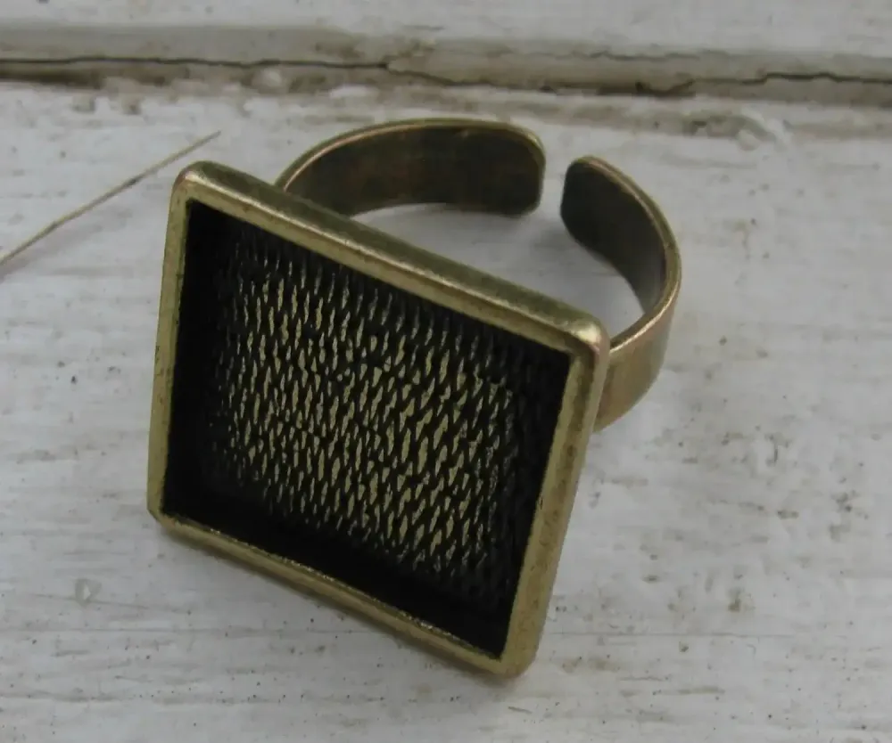 Ringstomme Bronsfärgad - Fyrkantig Ram 18mm 1 styck