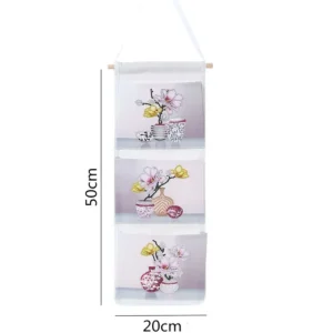 Hängare med blommotiv med 3 fickor för förvaring