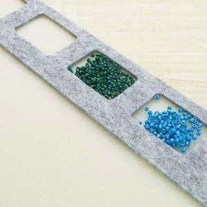 Pärlmatta med fördjupningar 35,6x27,9 cm - 1 styck