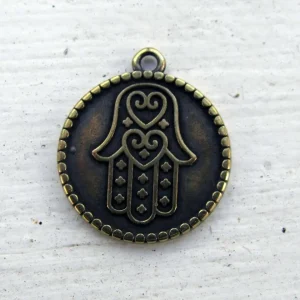 Berlock bronsfärgad - Rund med hamsa 20mm 1 styck