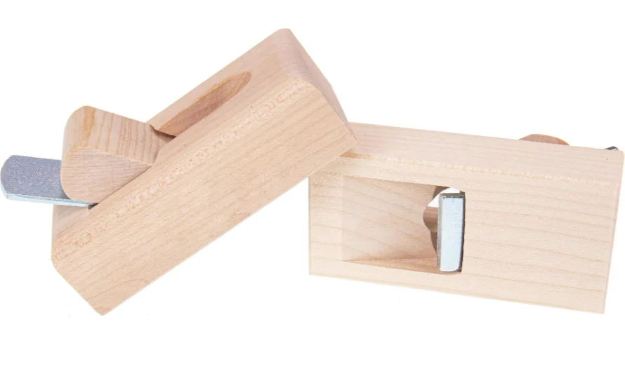 Flasköppnare hyvelform